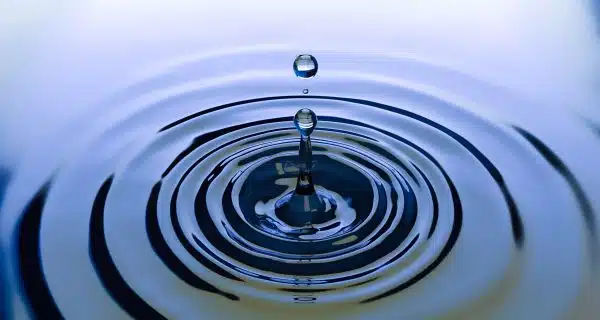 drop of water creating a ripple effect.