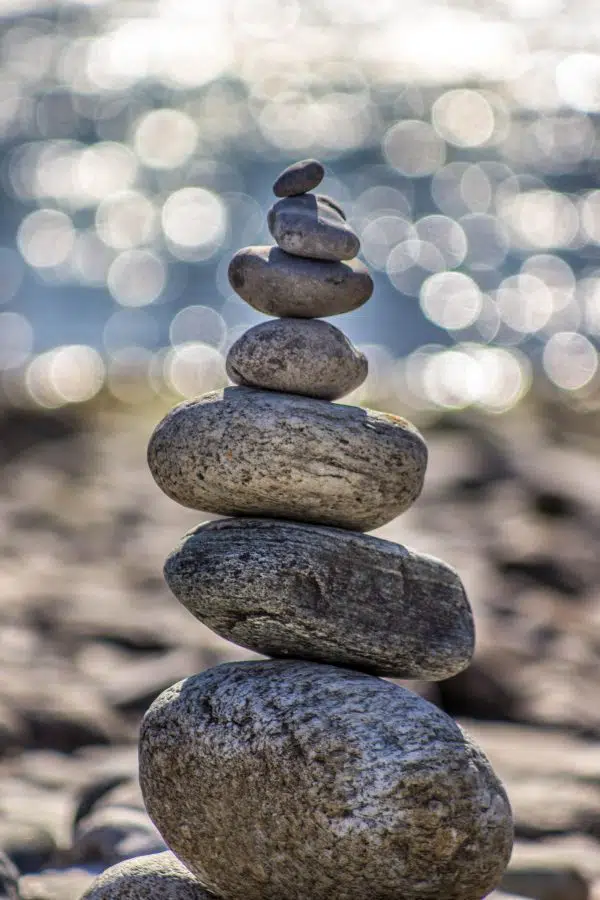 stack of rocks with ocean in background.