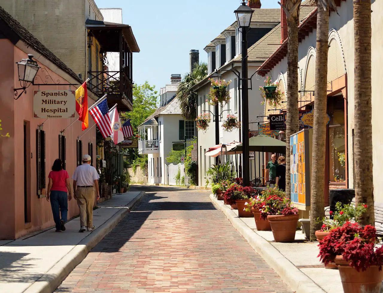 couple walking down Aviles street in St Augustine FL.