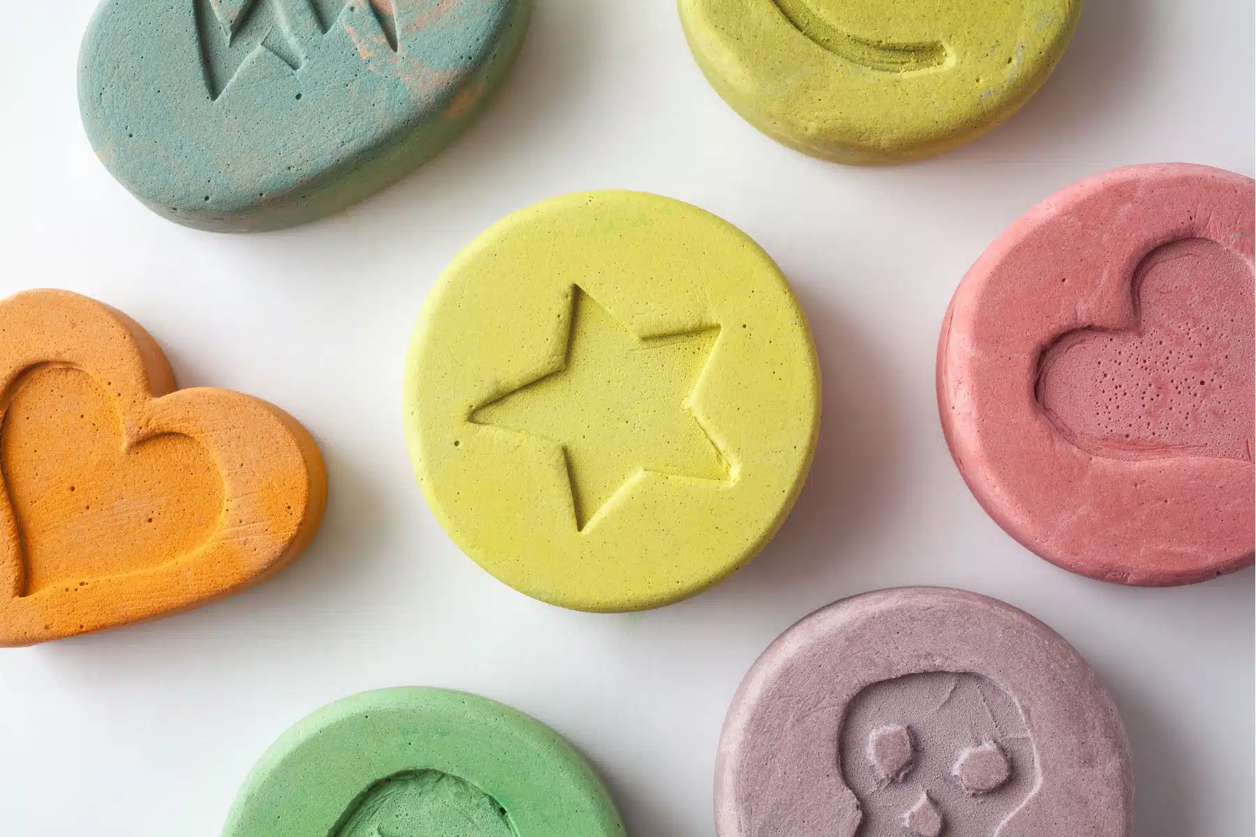 brightly colored and stamped pills.